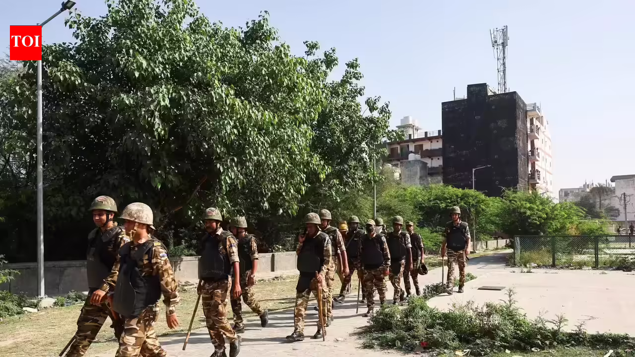 Factories reopen in Noida’s industry hub under heavy police watch. Noida News