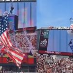 Terrifying moment skydiver hits scoreboard at Virginia Tech spring game after strong wind pushes parachute off landing path. International Sports News