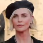 ‘Apex’ star Charlize Theron recalls her mother shooting her father to keep them safe.