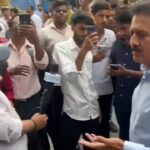 Maharashtra minister Girish Mahajan gets taste of woman’s anger during BJP’s Jan Aakrosh rally. Mumbai News