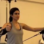 Mom-to-be Karishma Tanna flaunts her baby bump and shines in pregnancy glow as she works out in the gym.