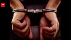 Man held for threatening woman with private photos | Bengaluru News