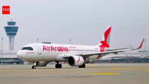 Passenger held after opening emergency exit on moving flight at Chennai airport. chennai news