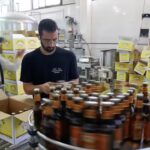 Facing bottle shortage, beer cos seek price hike