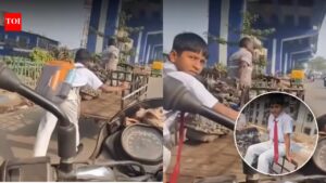 Young Boy Helps Father: Young boy in school uniform helps father pull his cart in scorching heat: 4 things privileged kids should learn from him