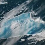 The great white giant turns blue: The final act of Iceberg A-23A |