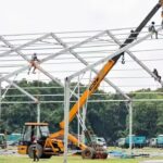 Kolkata: Brigade takes rain cover for new cabinet swearing-in. India News